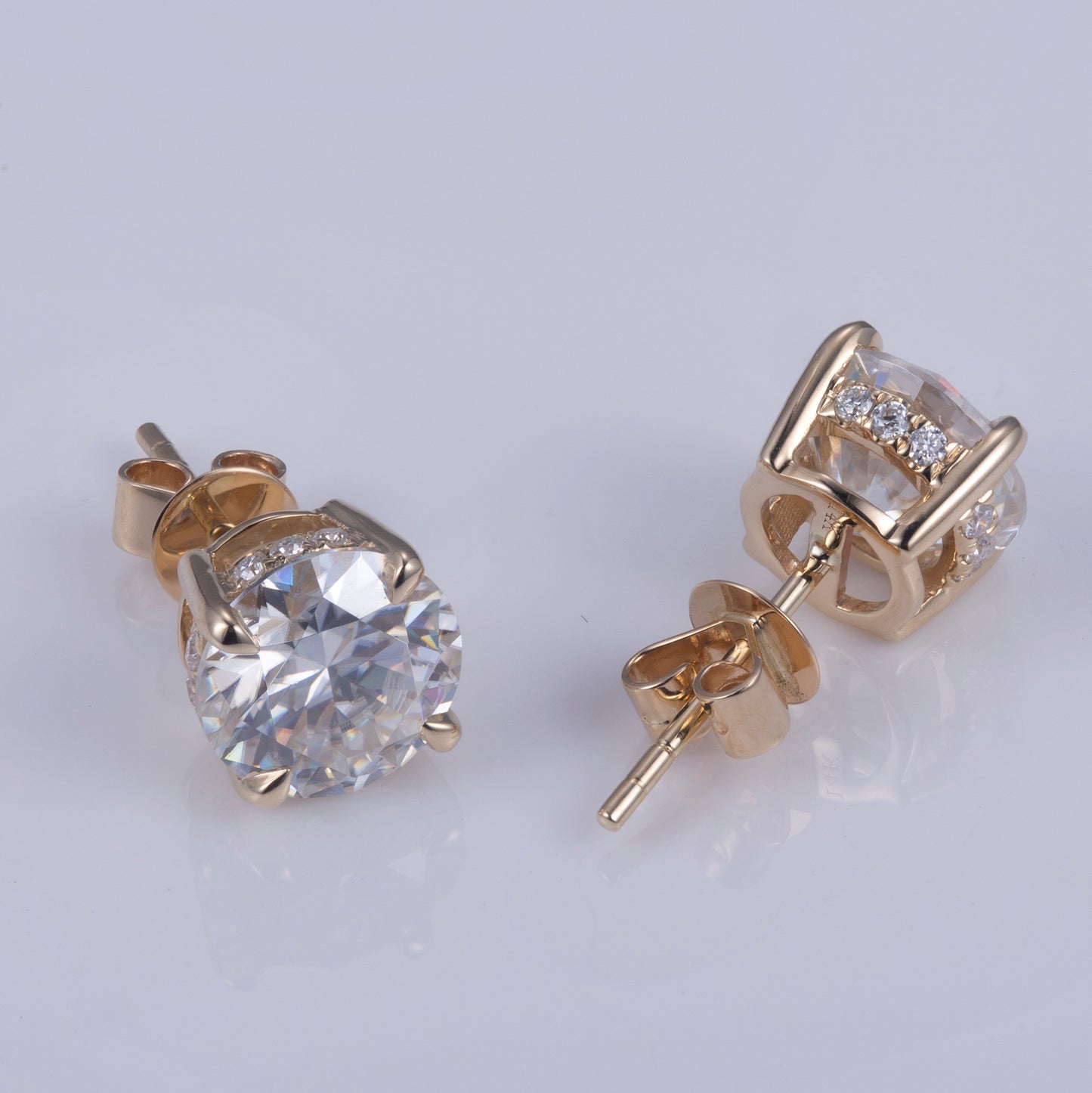 Ohrringe, je 1,5 ct Hauptsteine, 18k Gold