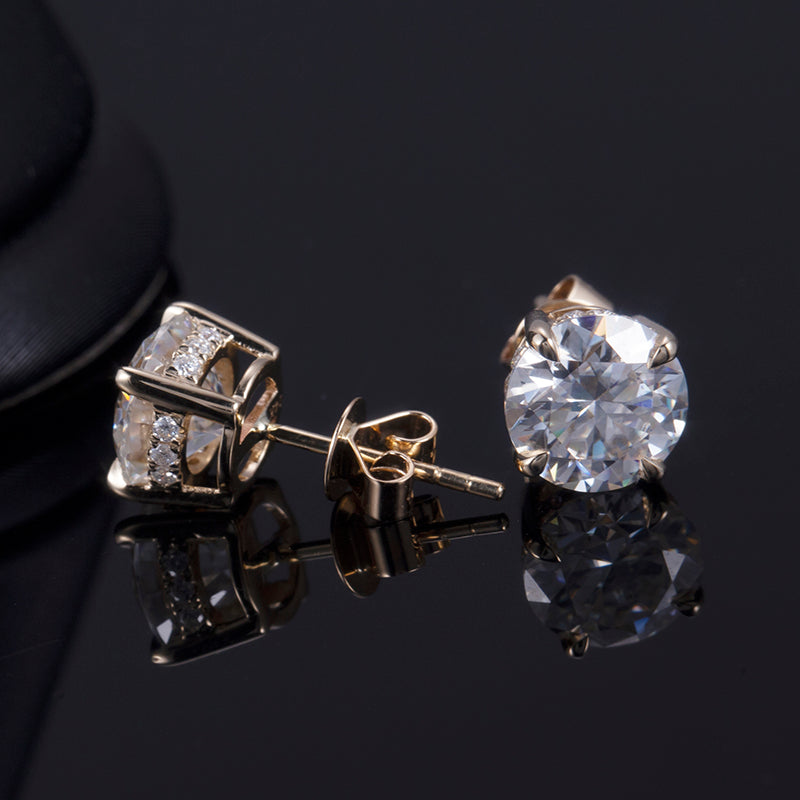 Ohrringe, je 1,5 ct Hauptsteine, 18k Gold