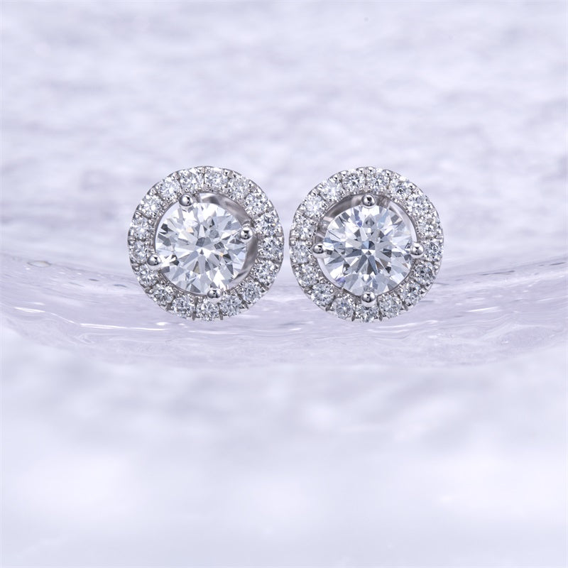 Ohrringe, je 1,35 ct, 18k Gold