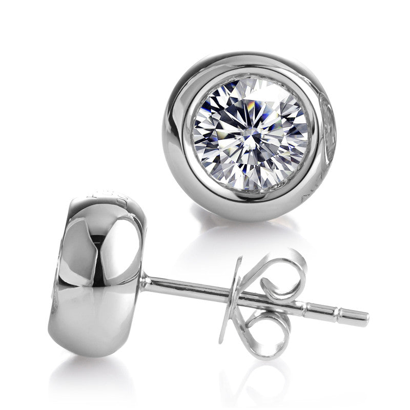 Ohrringe, je 1,0 ct Hauptsteine, 18k Gold