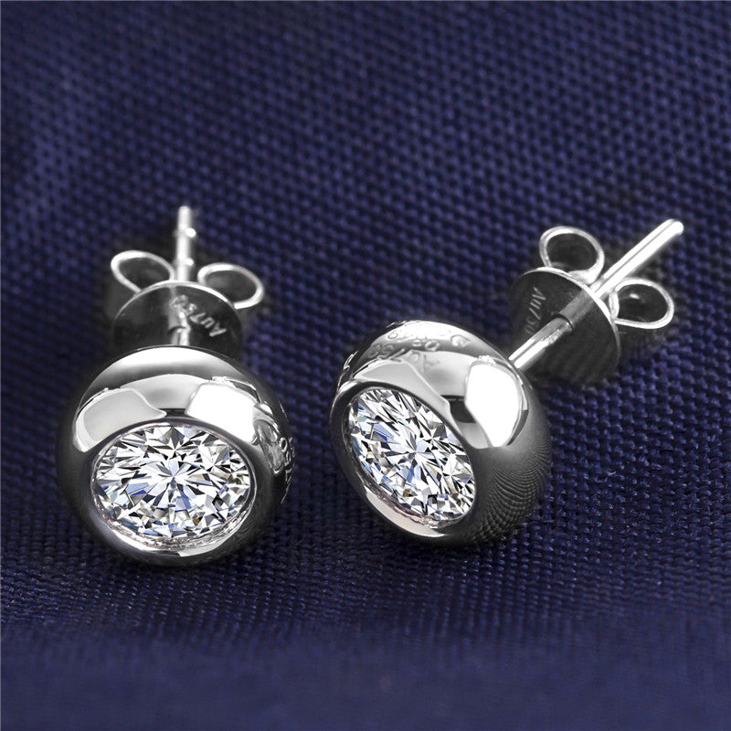 Ohrringe, je 1,0 ct Hauptsteine, 18k Gold