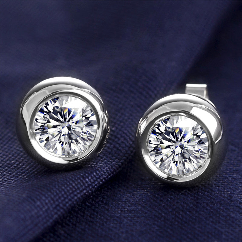 Ohrringe, je 1,0 ct Hauptsteine, 18k Gold