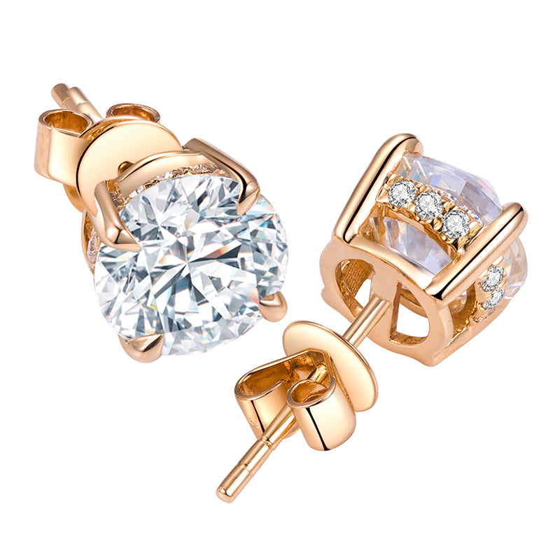 Ohrringe, je 1,5 ct Hauptsteine, 18k Gold